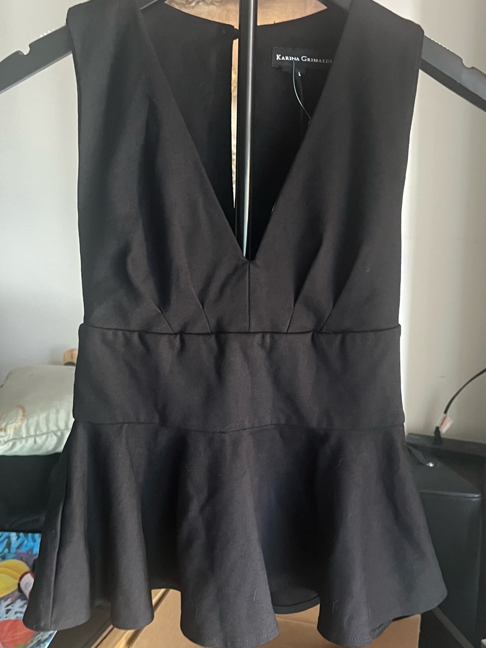 Karina Grimaldi Black Sleeveless V-Neck Peplum Blouse